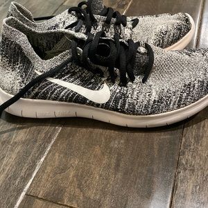 Black and white nike fly knits